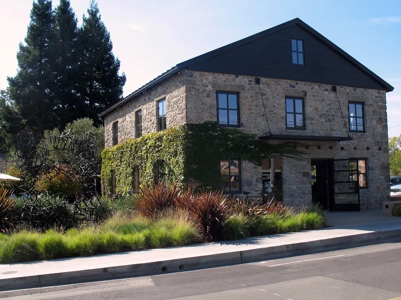 A historic house with a porch on Washington Street in Yountville