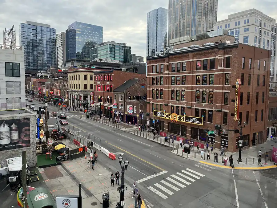 Lower Broadway by day, with the Acme Feed and Seed building