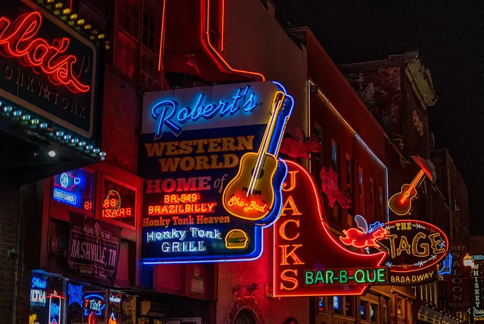 Lower Broadway's neon honky-tonk signs glowing at night