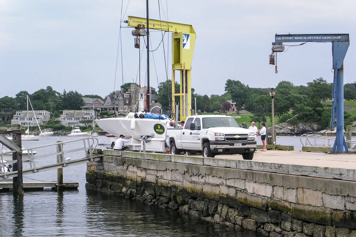 A wooden pier with boats on Newport Harbor, Rhode Island
