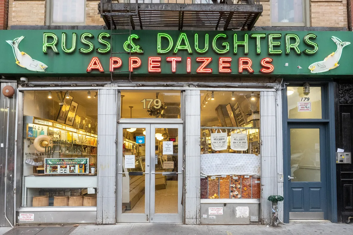 The storefront and sign of the original Russ & Daughters shop on East Houston Street