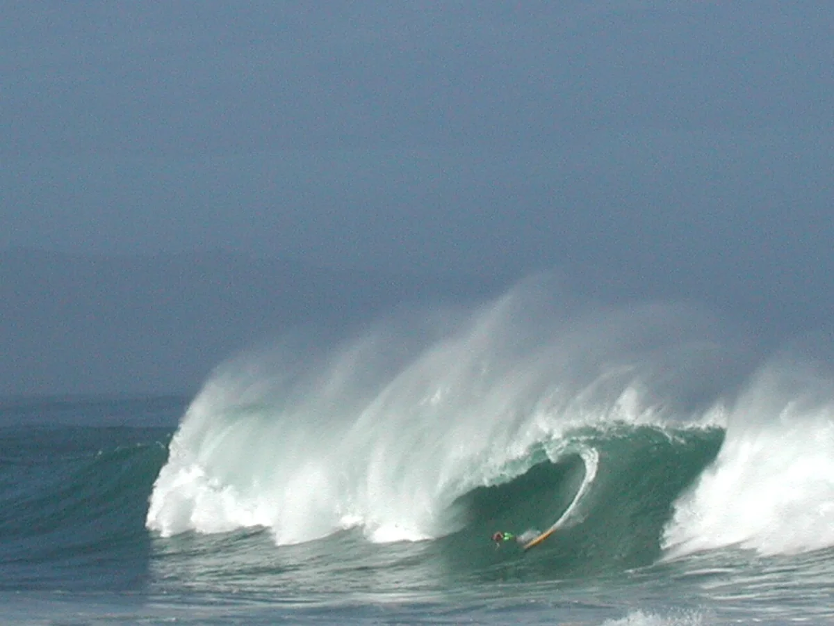 A massive winter wave breaking at Waimea Bay