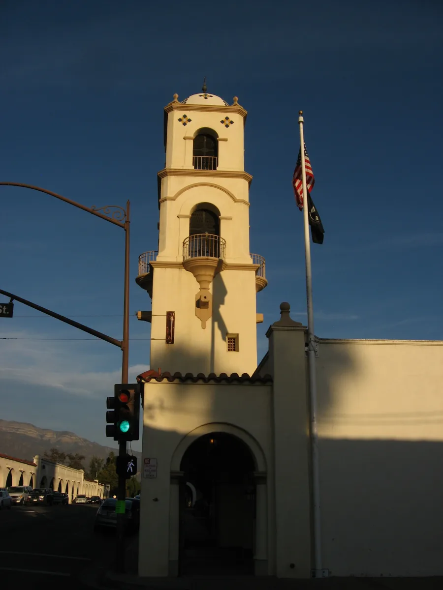 The Ojai post office bell tower in white stucco against a deep blue sky