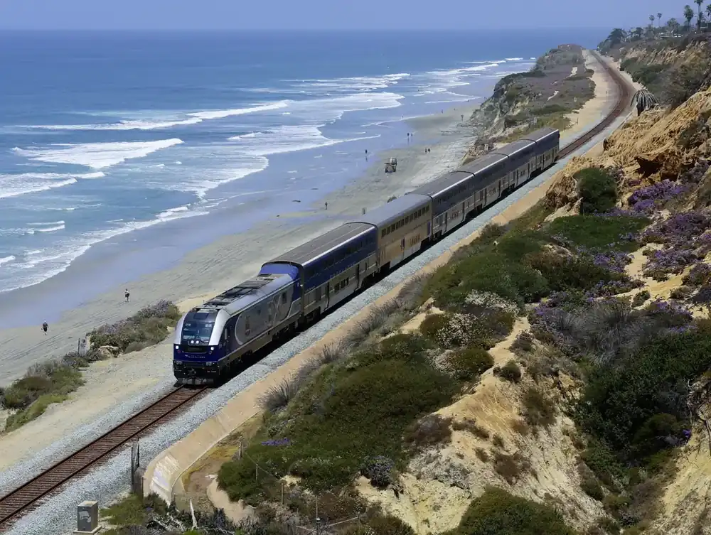 The Pacific Surfliner rounding the Del Mar bluffs above the Pacific