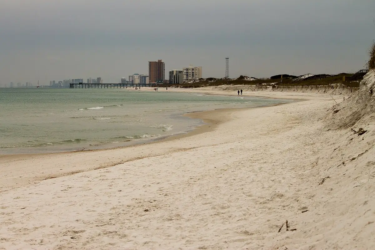 White-sand beach at Panama City Beach with a fishing pier and condos