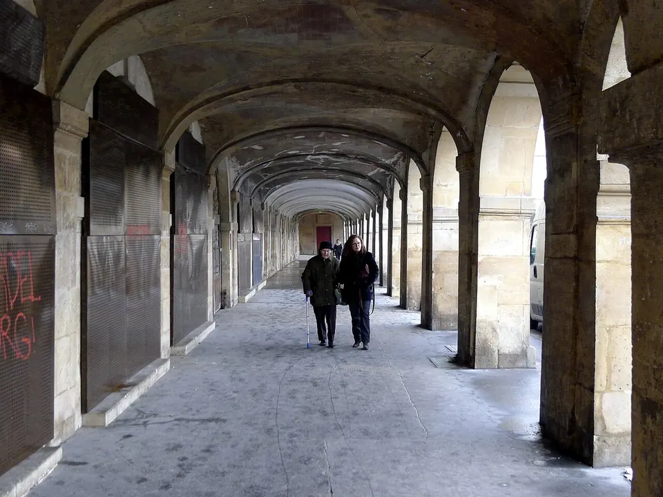 The arcades of Place des Vosges in Le Marais