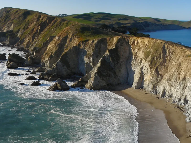The Point Reyes headlands and cliffs seen from Chimney Rock in winter, with a beach below