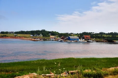 Stanley Bridge harbour on Prince Edward Island, a calm bay with boats and buildings along the shore