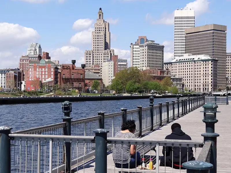 Downtown Providence skyline from the Riverwalk, the Superman building rising over the water
