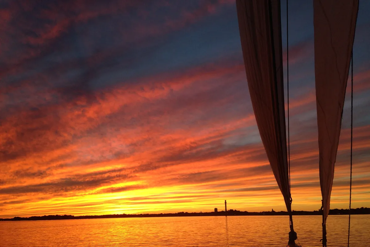 Sunset over the harbor and the rooftops of Provincetown
