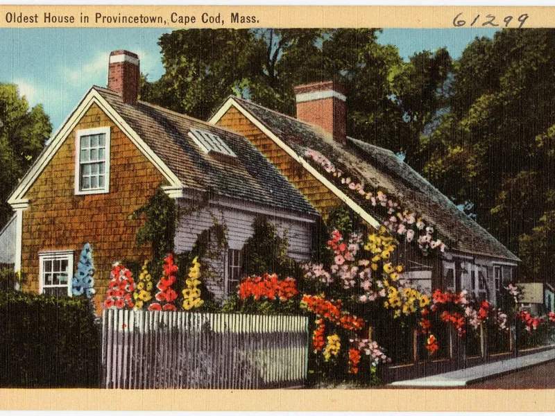 An old postcard of a small weathered Cape house in Provincetown