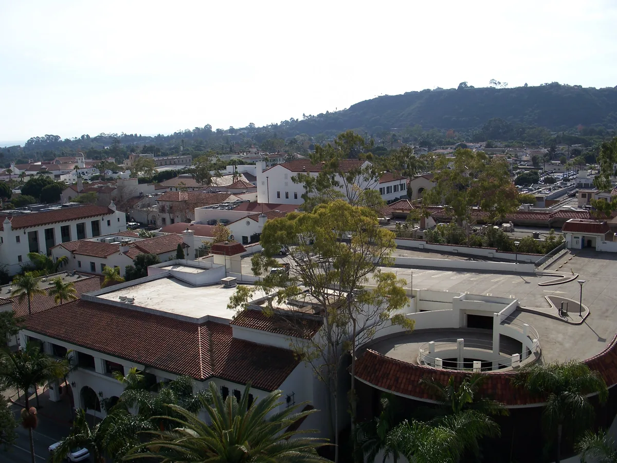 Red-tile roofs, palms and the ocean seen from the Santa Barbara County Courthouse tower