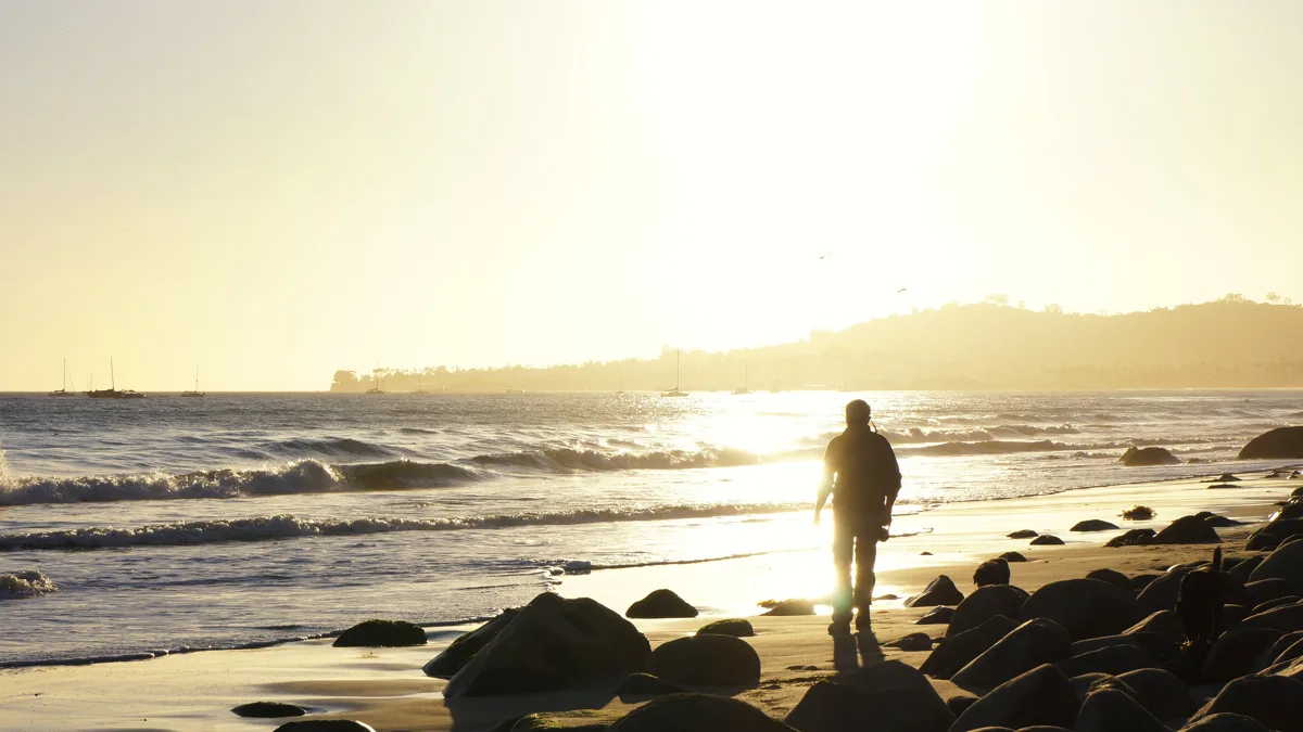 A bright white sunset over the ocean at Butterfly Beach in Montecito