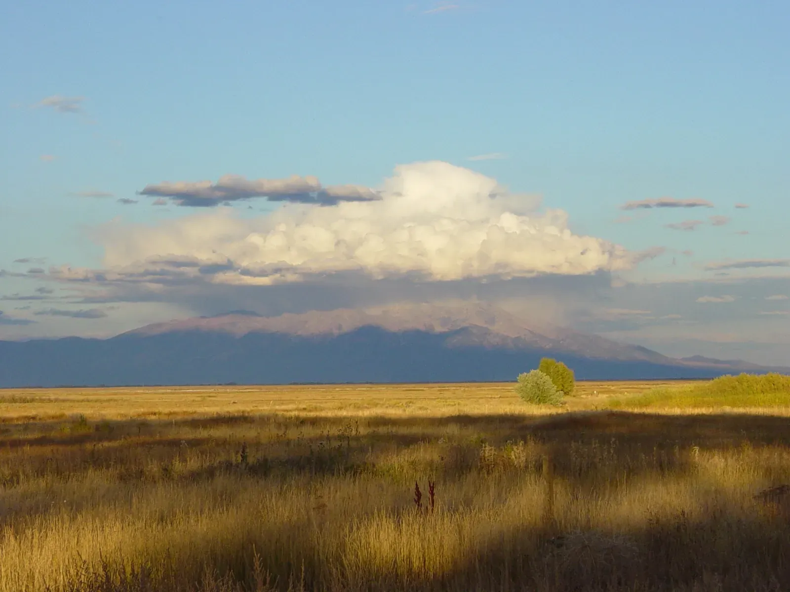 Sangre de Cristo Mountains glowing at sunset above Santa Fe