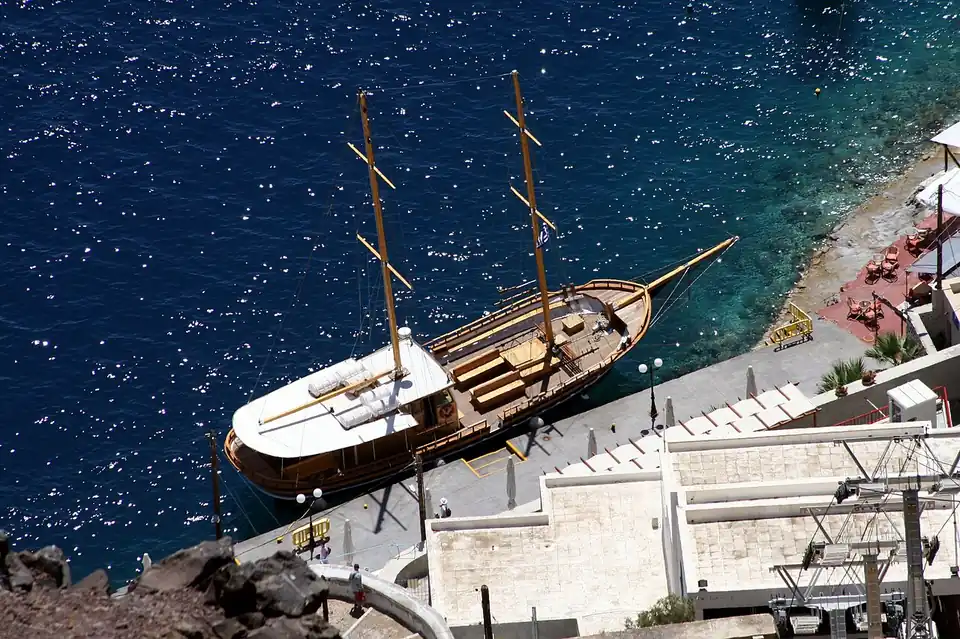 Catamaran sailing the caldera