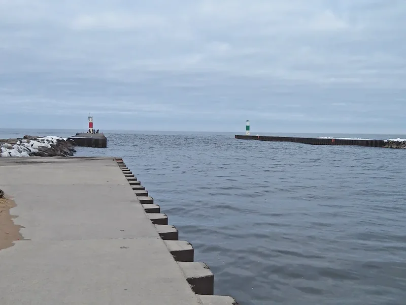 The harbor piers and navigation structures at the Saugatuck river mouth