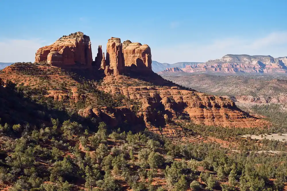 Cathedral Rock trail with hikers among red rock formations