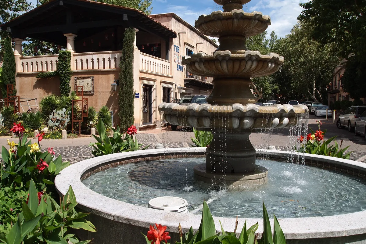 A stone courtyard and arches at Tlaquepaque in Sedona