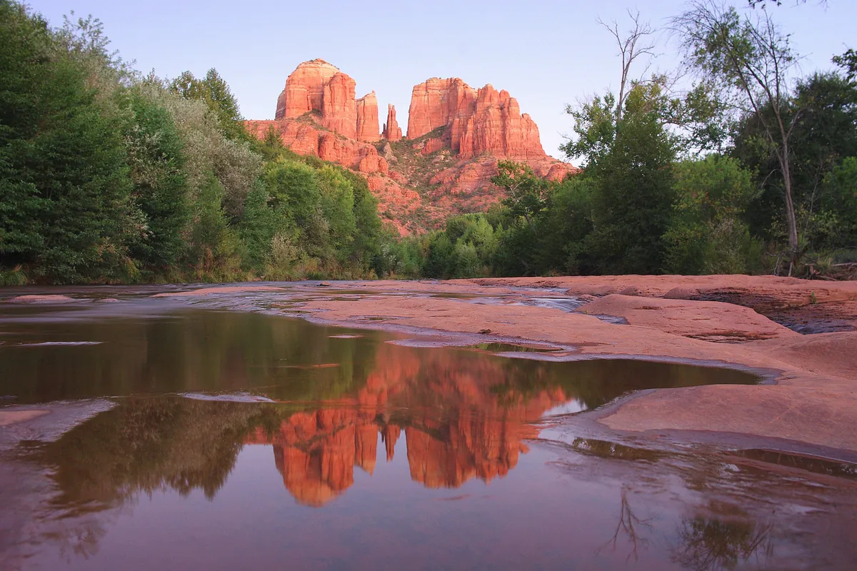 Cathedral Rock reflected in Oak Creek at Red Rock Crossing after sunset