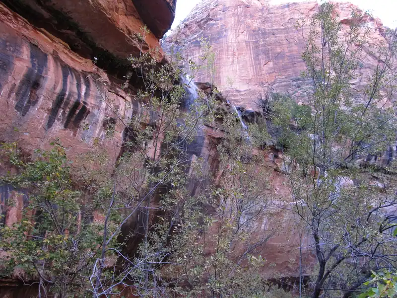 Waterfall spilling over sandstone at Lower Emerald Pools