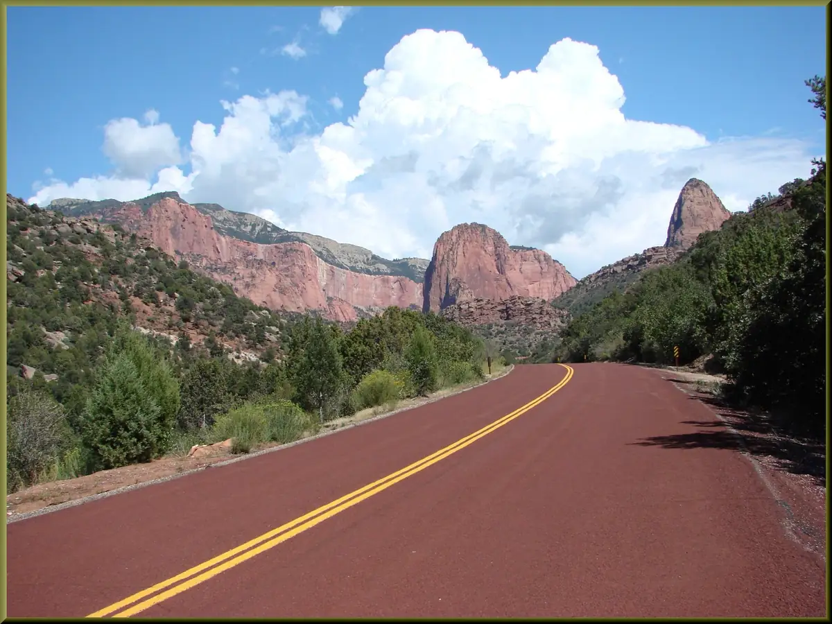 The Kolob Canyons scenic road beneath red rock domes