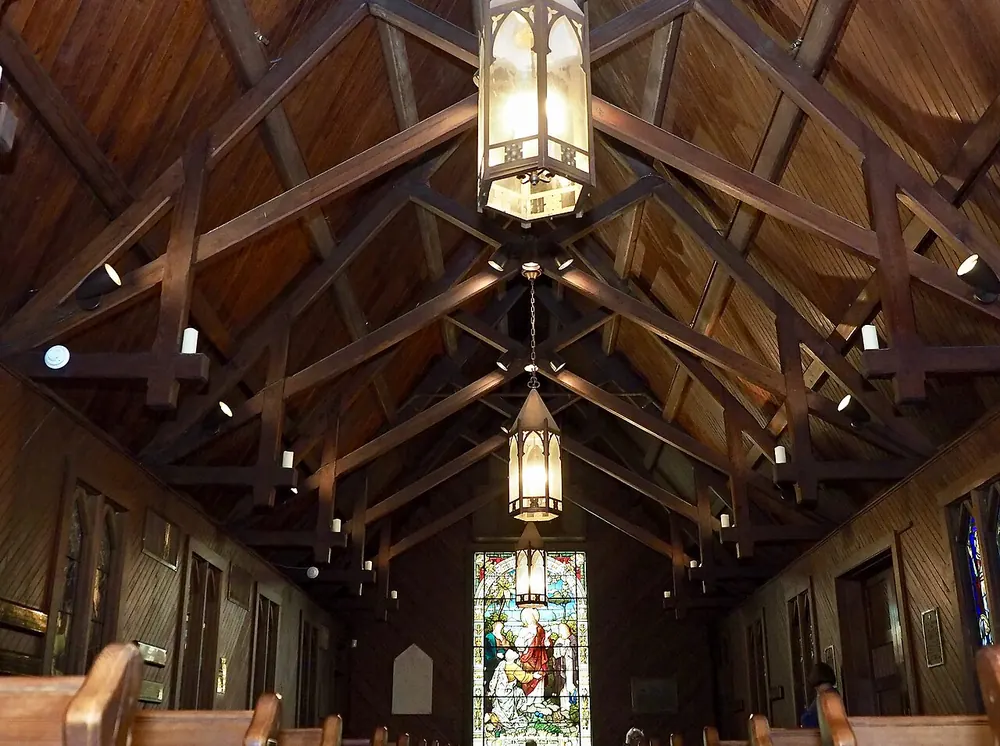 Inside Christ Church, Frederica: timbered roof and stained glass