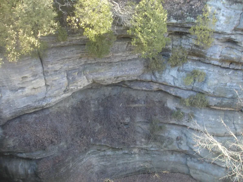 A sandstone canyon at Starved Rock State Park with a waterfall