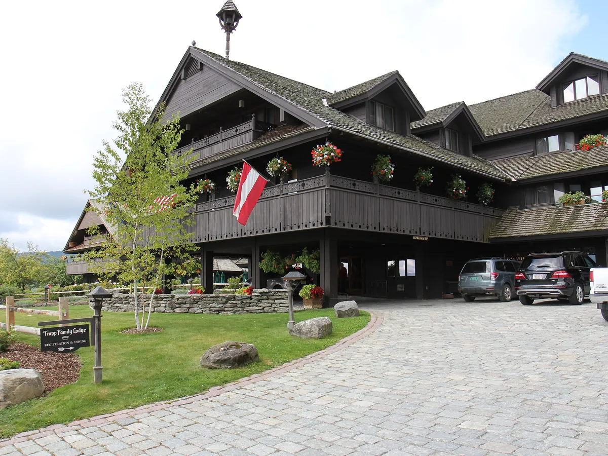 The Trapp Family Lodge, a large wooden Austrian-style lodge with balconies and a paved drive