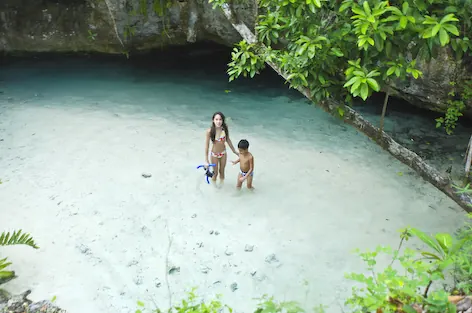 Swimming in Gran Cenote's clear water