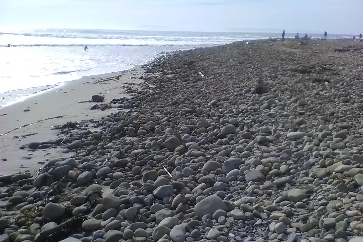 The cobblestone beach and rebuilt dunes at Surfers Point at the mouth of the Ventura River