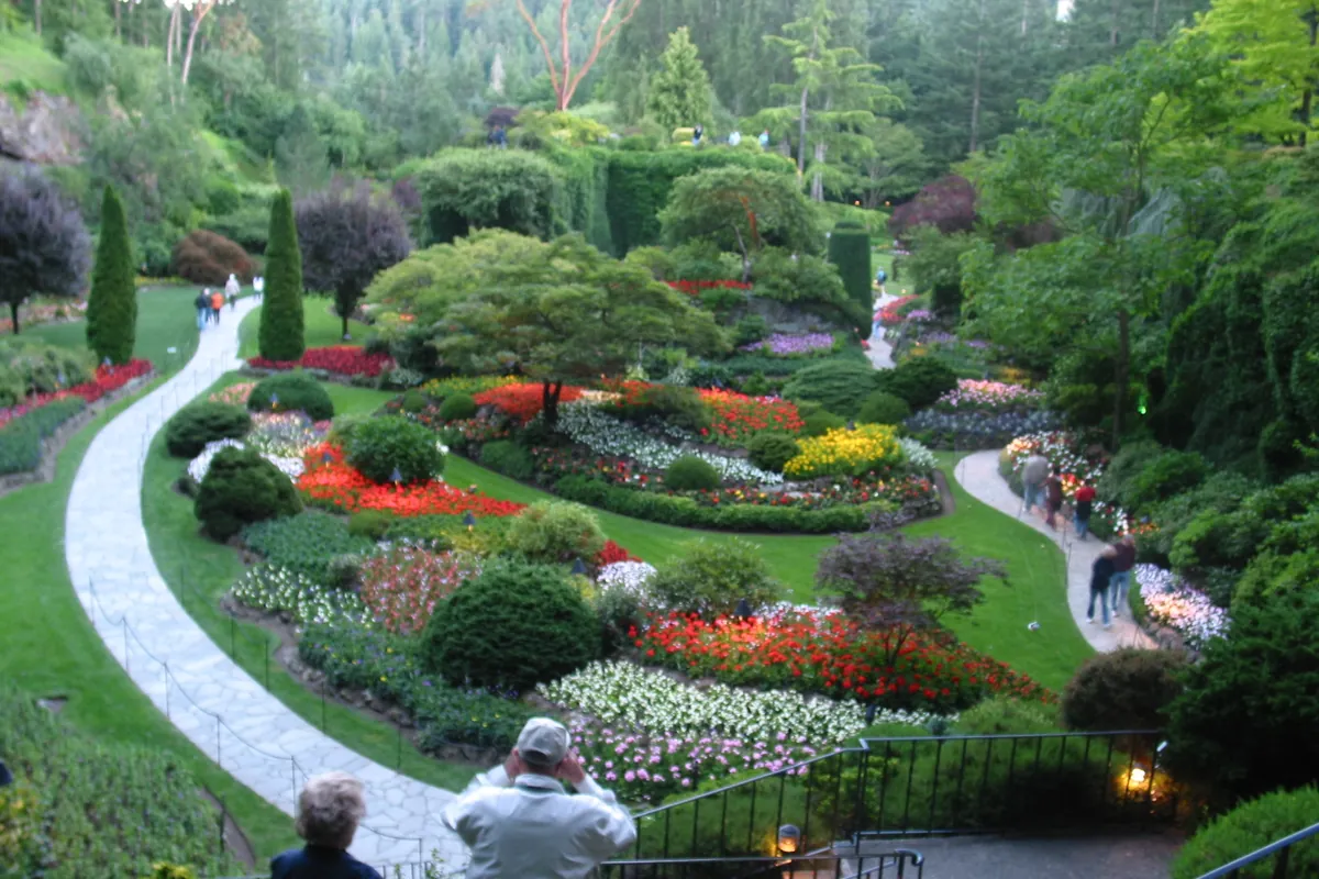 The Sunken Garden at The Butchart Gardens, planted beds in an old quarry with rock walls