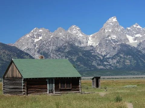 Mormon Row barns under a wide Teton sky